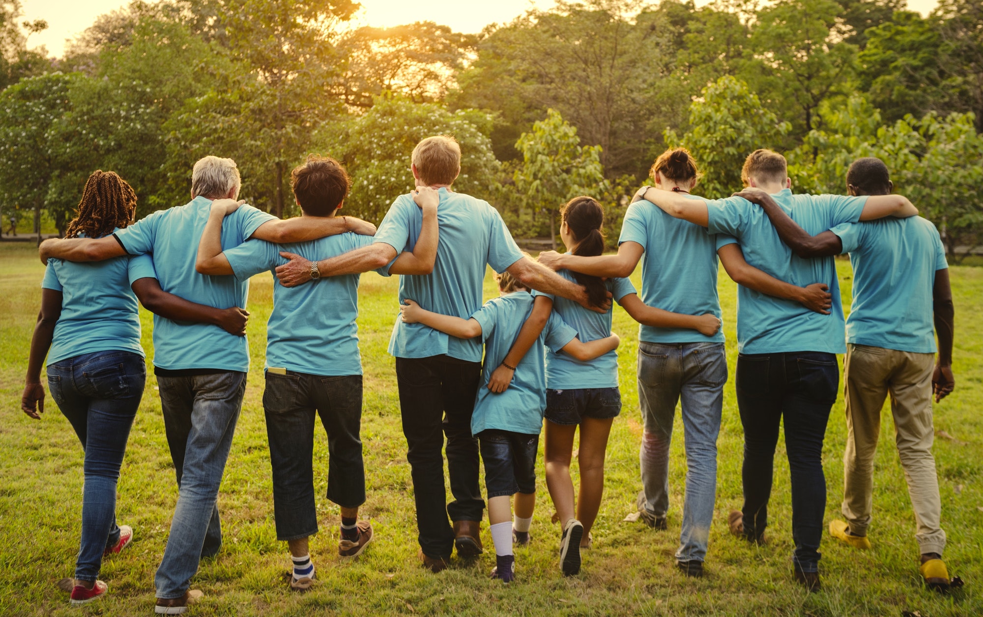 Group of diversity people volunteen arm around